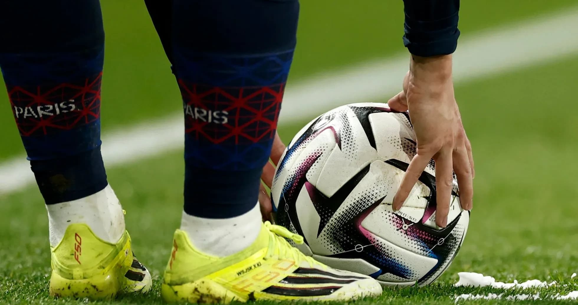 Player placing ball for a set piece Player placing ball for a set piece