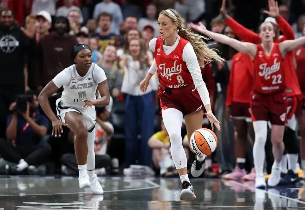 Two basketball players competing for the ball Two basketball players competing for the ball