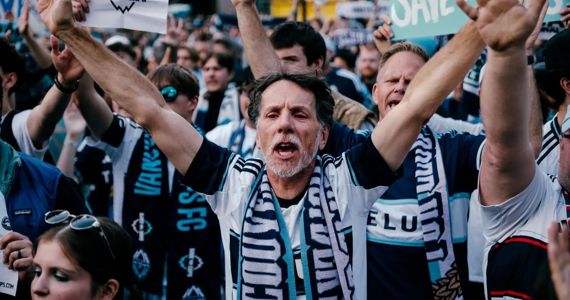 Vancouver fans cheering with banners during match Vancouver fans cheering with banners during match