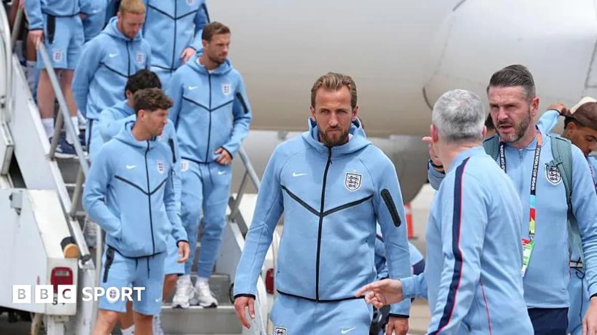 England team disembarking from plane in training gear England team disembarking from plane in training gear