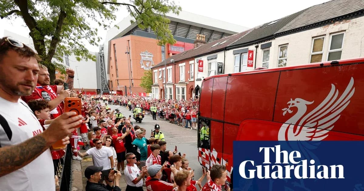 Liverpool fans welcoming team bus outside Anfield Liverpool fans welcoming team bus outside Anfield