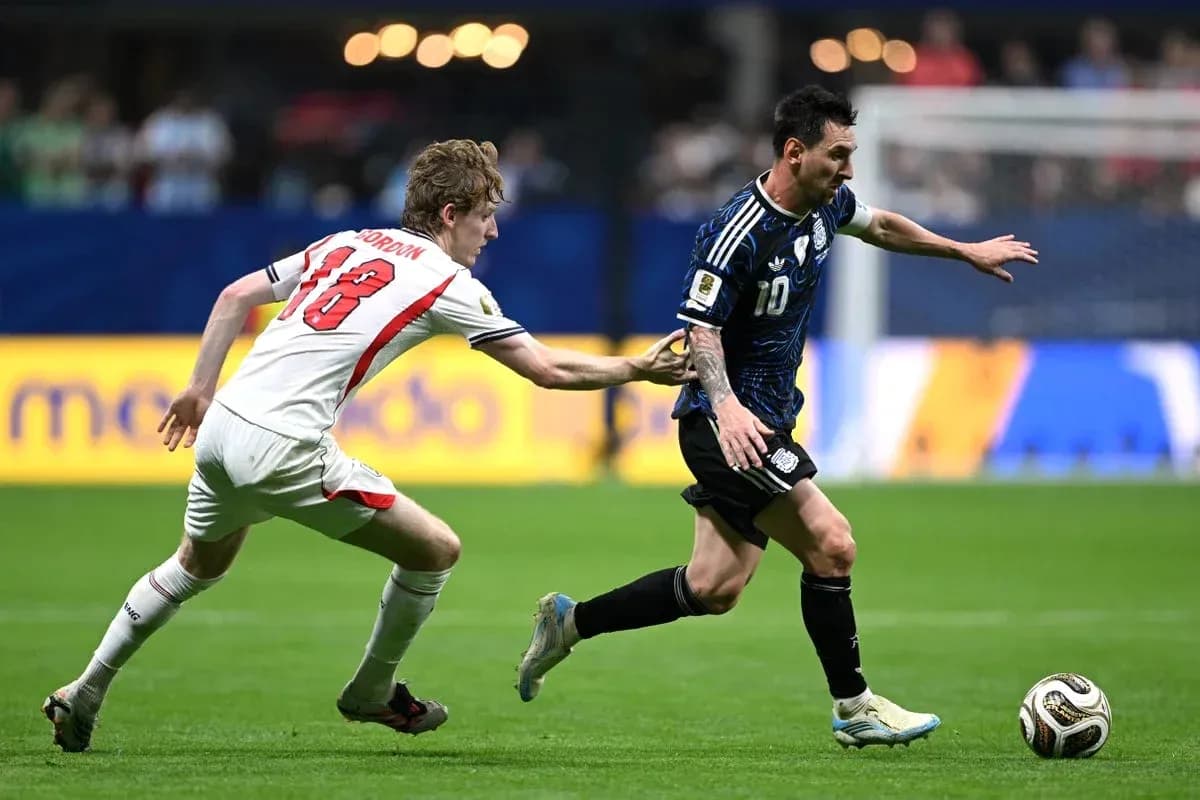 Lionel Messi evading defender during soccer match Lionel Messi evading defender during soccer match
