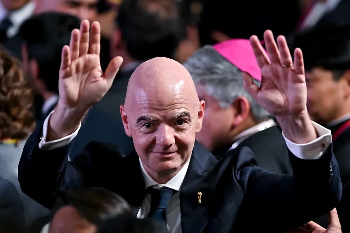 Man waving in a crowd during an event Man waving in a crowd during an event