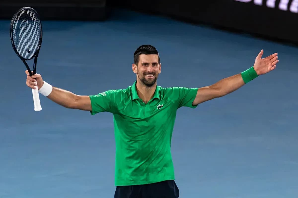 Tennis player celebrating after winning a match Tennis player celebrating after winning a match