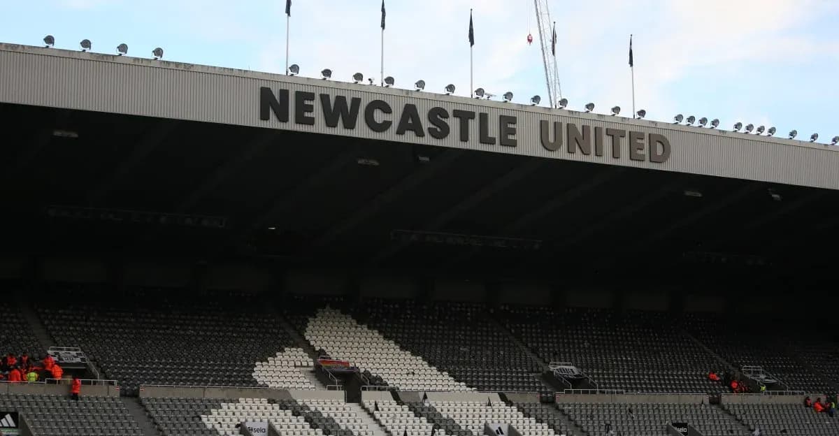 Newcastle United stadium seating area with signage Newcastle United stadium seating area with signage