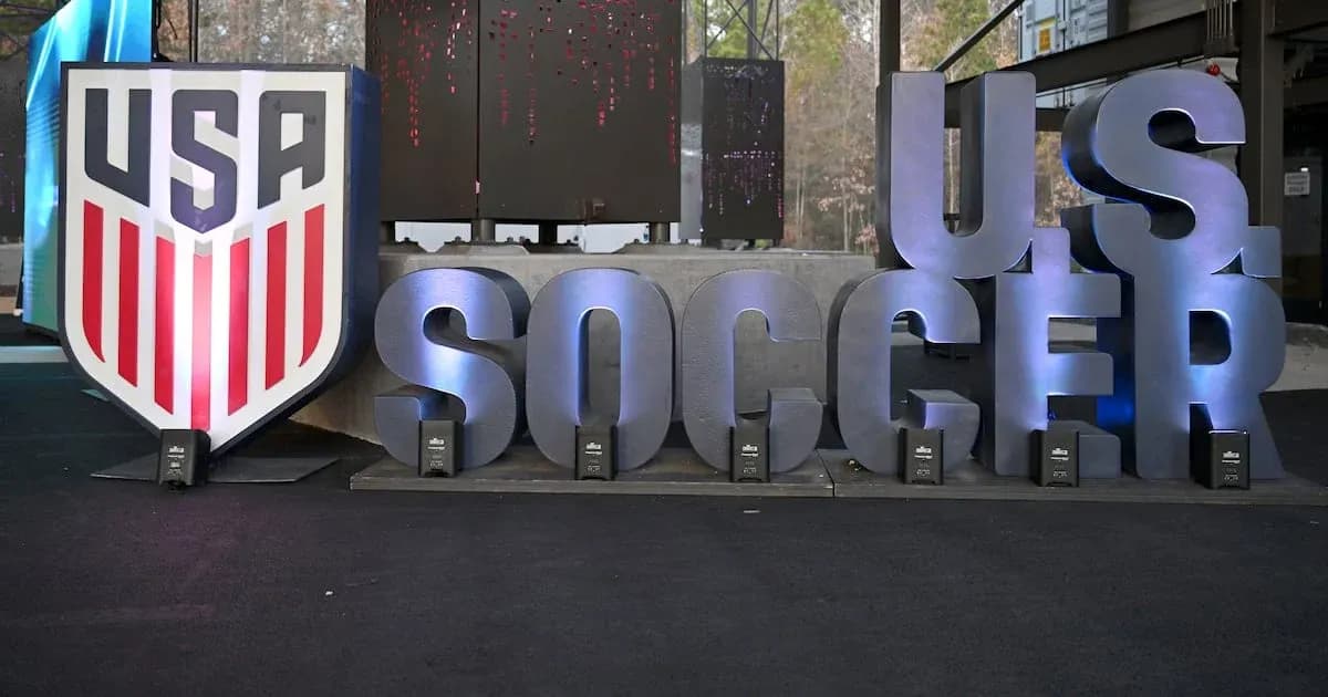 USA Soccer logo displayed at an event USA Soccer logo displayed at an event