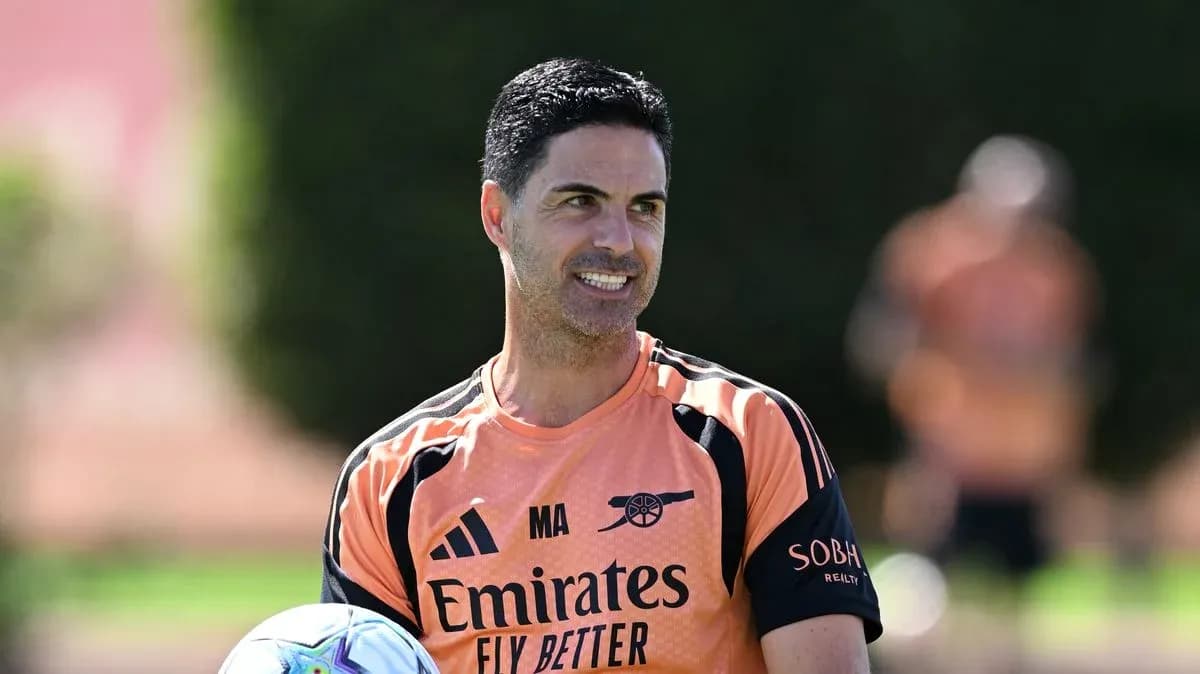 Mikel Arteta holding a ball during training session Mikel Arteta holding a ball during training session