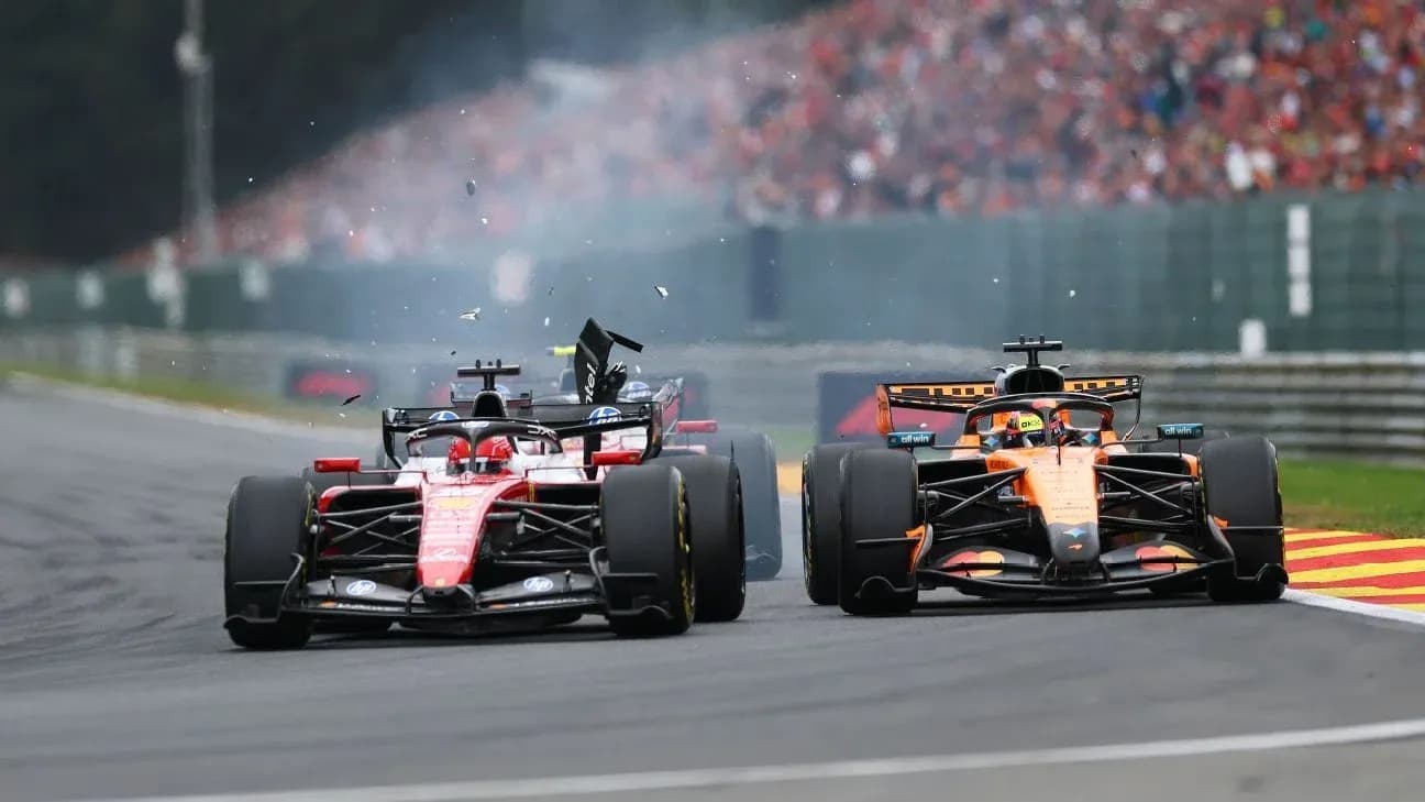 Ferrari and McLaren cars in a close race Ferrari and McLaren cars in a close race