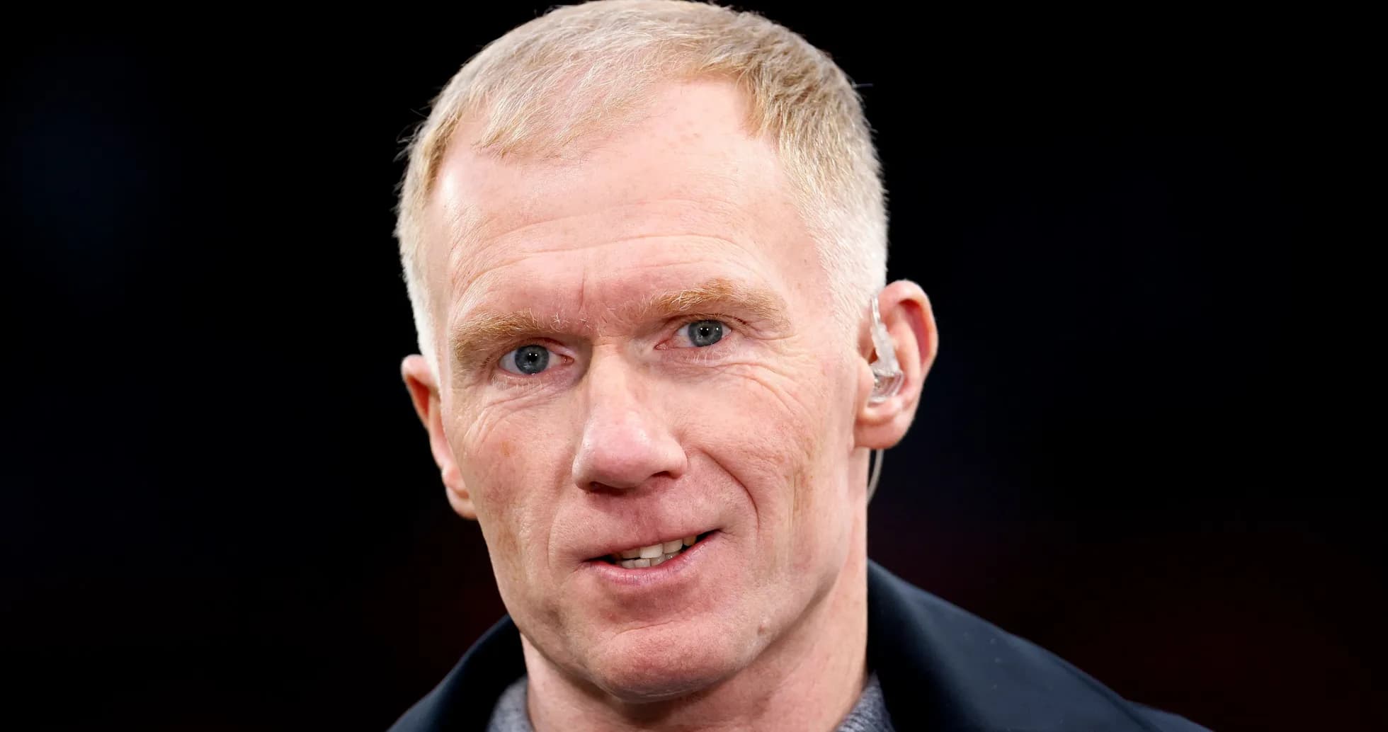 Shirted man with short hair and earpiece Shirted man with short hair and earpiece