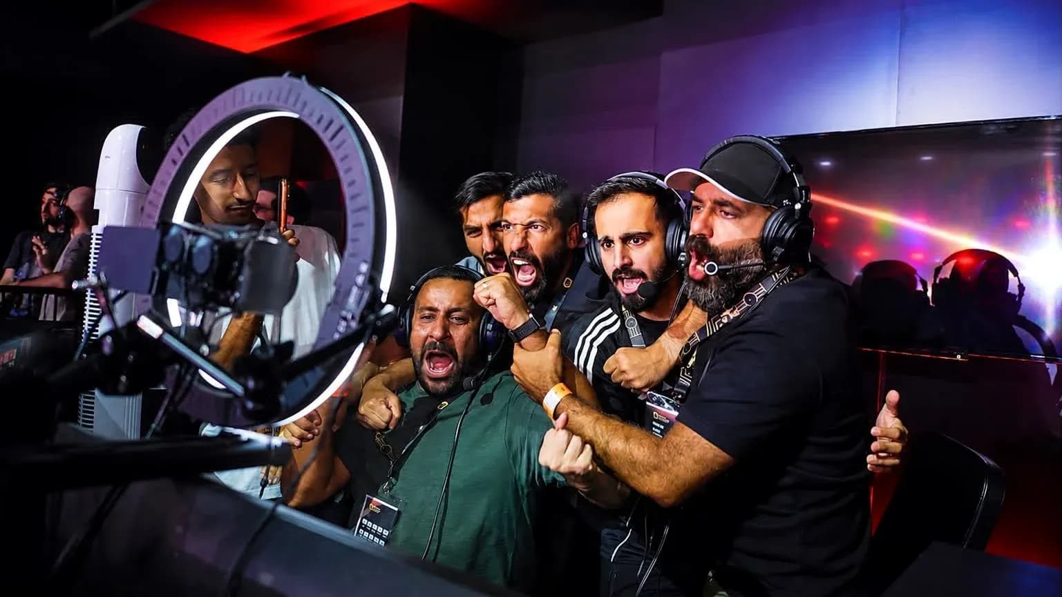 Commentators celebrating intensely during esports event Commentators celebrating intensely during esports event