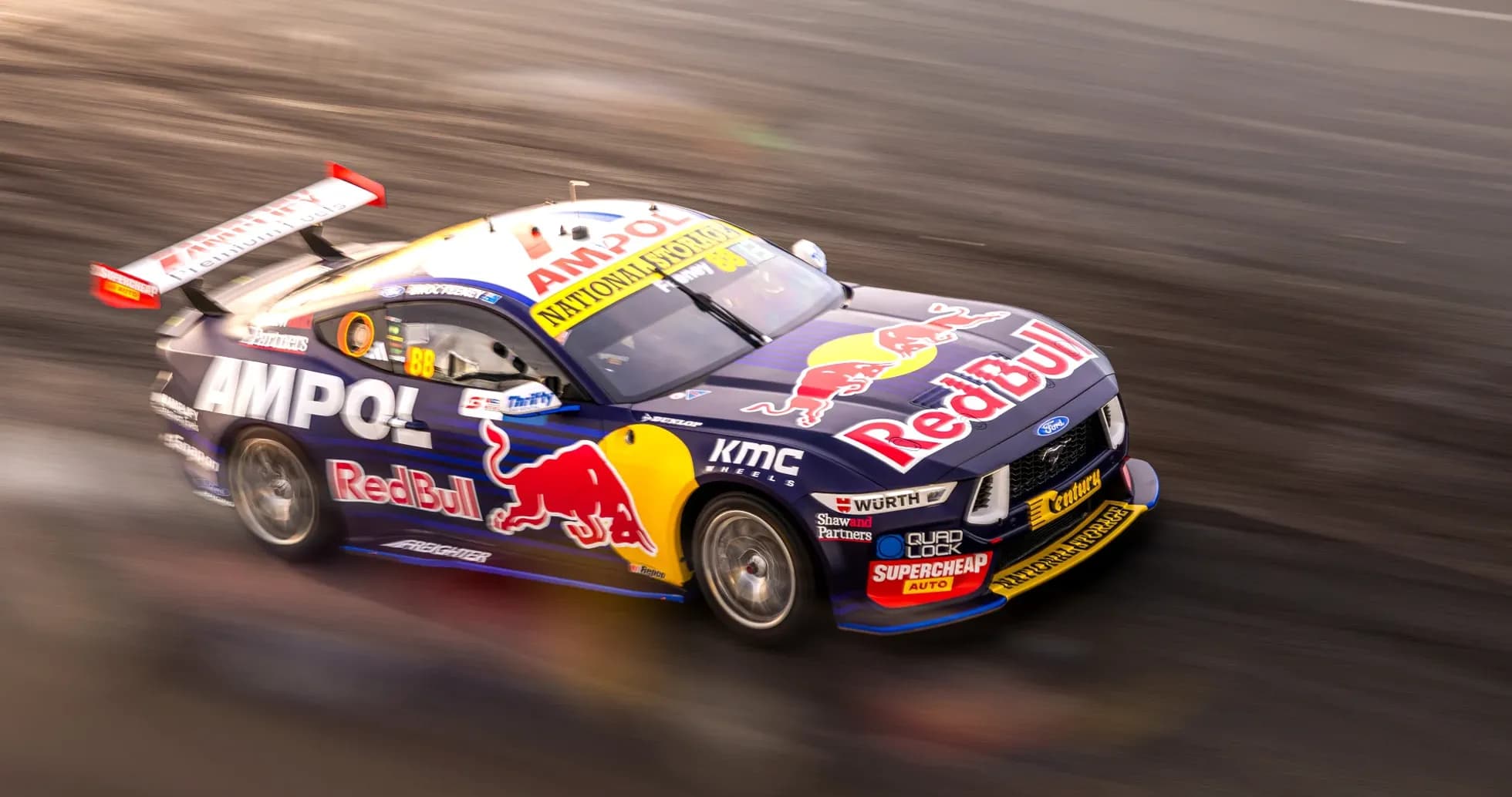 Red Bull racing car speeding on track Red Bull racing car speeding on track