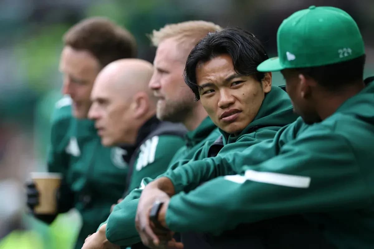 Players sitting on bench during a match Players sitting on bench during a match