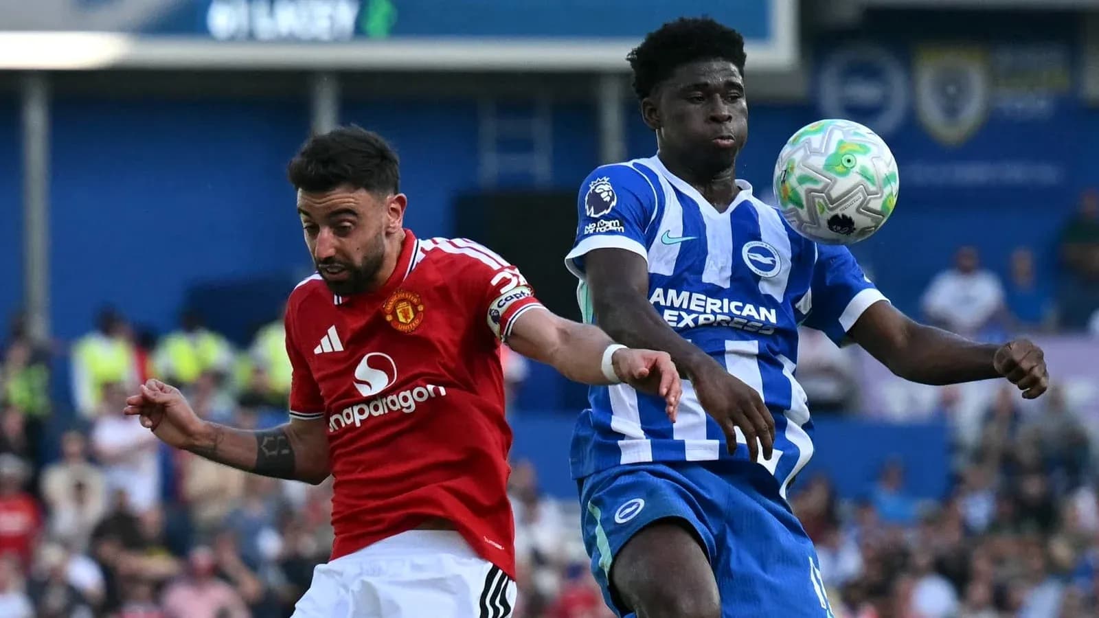Bruno Fernandes and player contesting for the ball Bruno Fernandes and player contesting for the ball