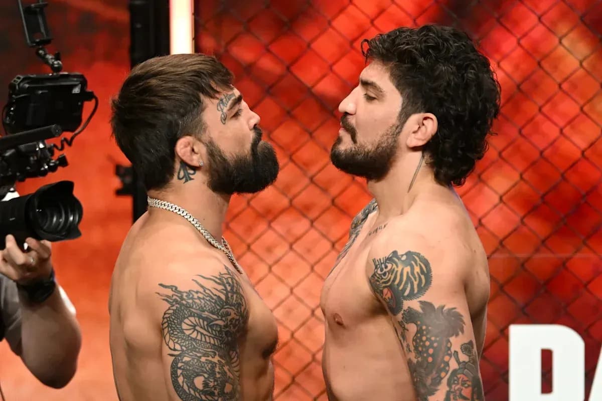 Two fighters facing off during weigh-in event Two fighters facing off during weigh-in event