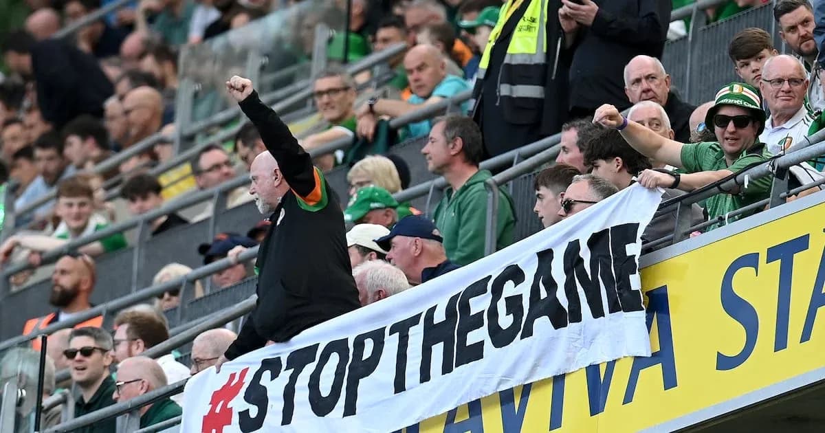 Fans holding a banner during a sports event Fans holding a banner during a sports event