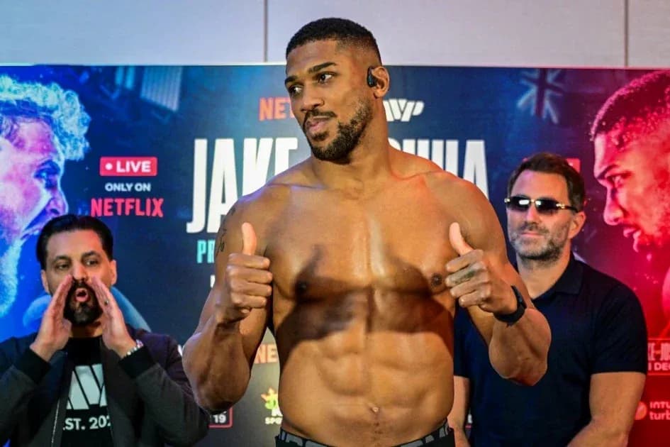 Boxer posing at press conference for fight announcement Boxer posing at press conference for fight announcement