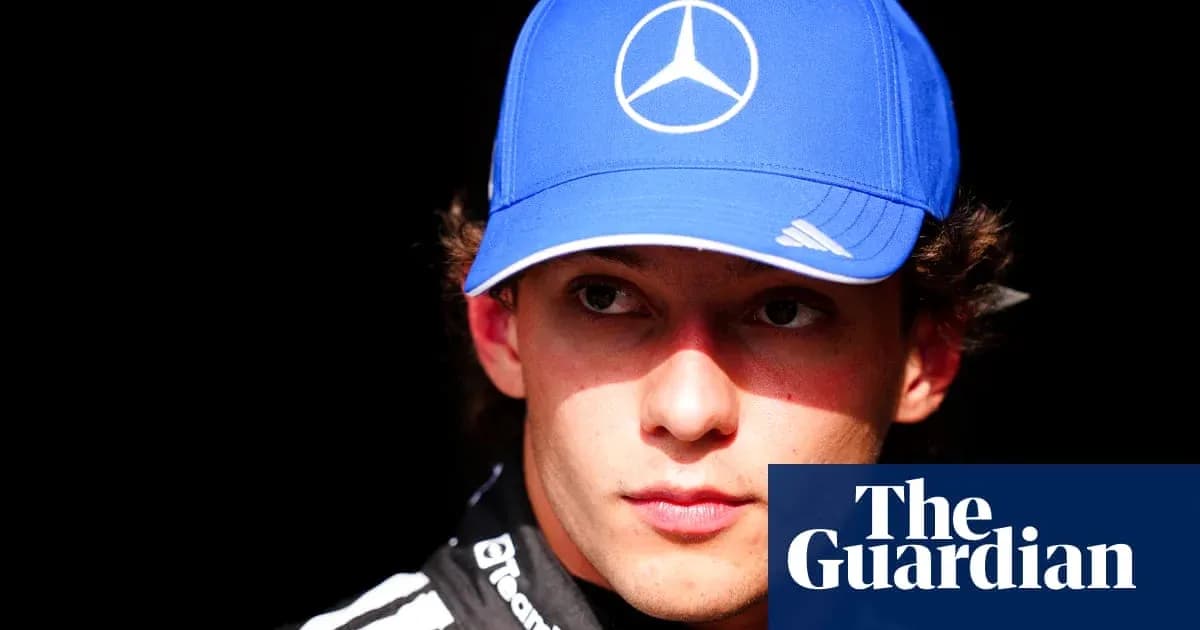 Yoshida wearing a blue cap in the paddock Yoshida wearing a blue cap in the paddock