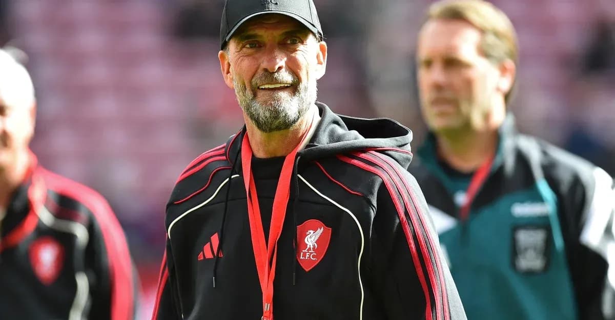 Liverpool FC manager on the pitch during match Liverpool FC manager on the pitch during match