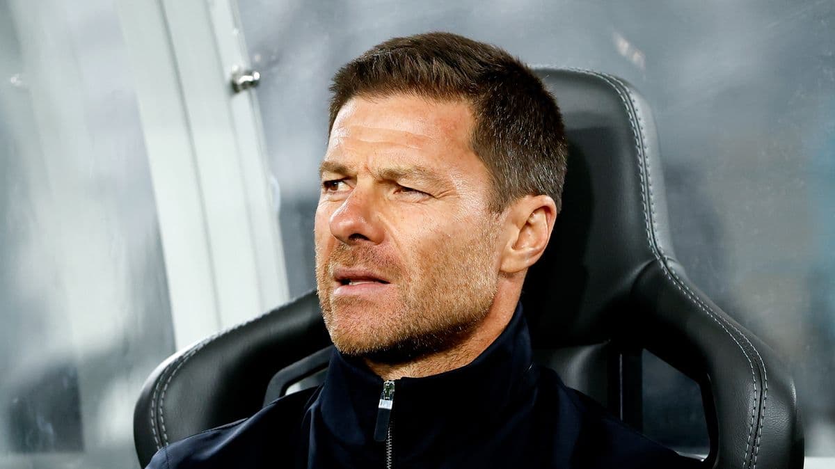 Coach sitting on bench during a match Coach sitting on bench during a match