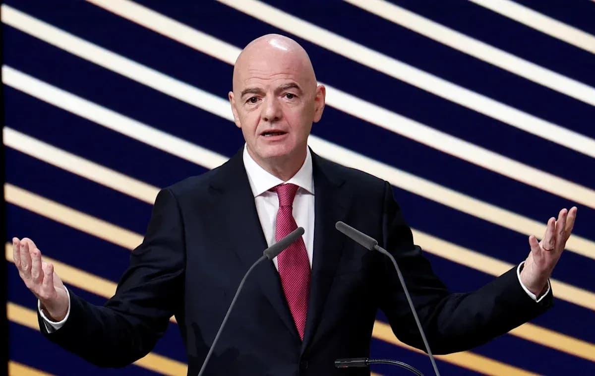 FIFA president speaking at press conference podium FIFA president speaking at press conference podium