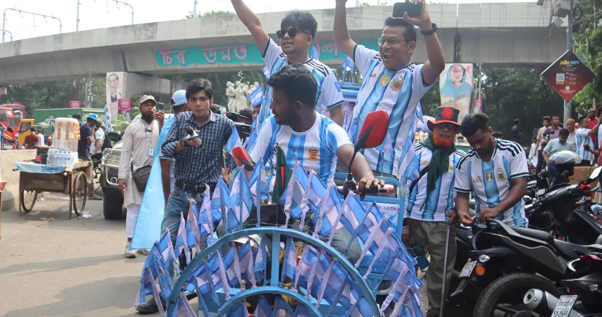 Fans celebrating with flags before match Fans celebrating with flags before match