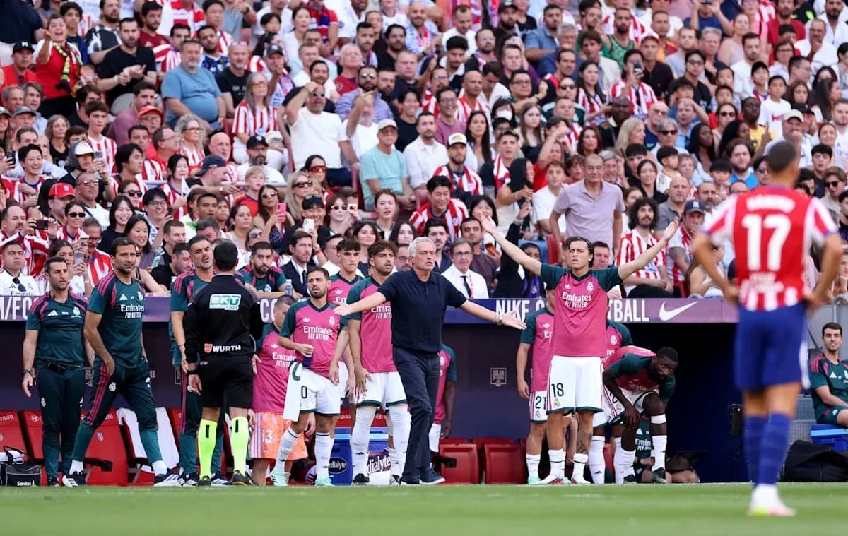 Coaches and players on bench during match Coaches and players on bench during match