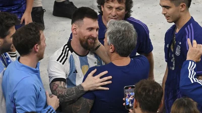Lionel Messi celebrating with teammates after victory Lionel Messi celebrating with teammates after victory