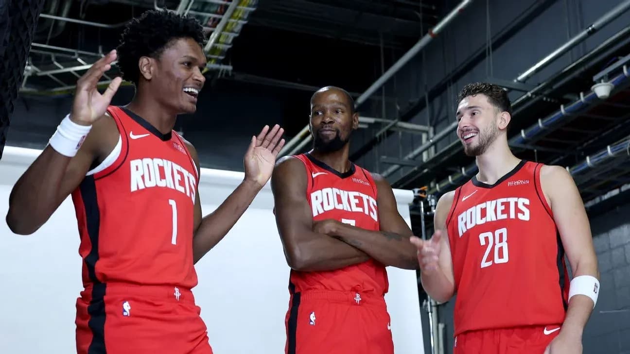 Three Houston Rockets players posing for photoshoot Three Houston Rockets players posing for photoshoot