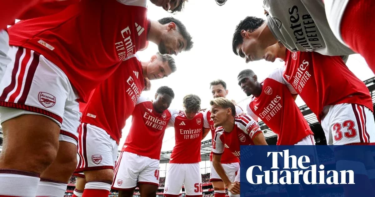 Arsenal players in huddle before the match Arsenal players in huddle before the match