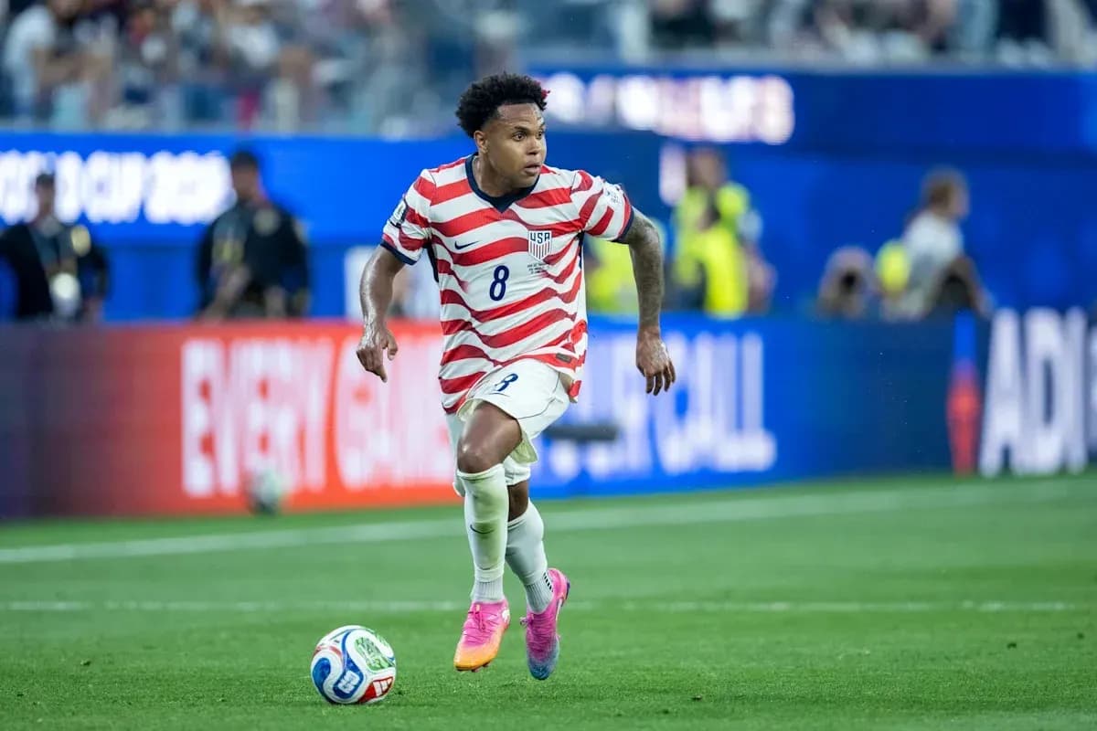 US player dribbling ball during match action US player dribbling ball during match action