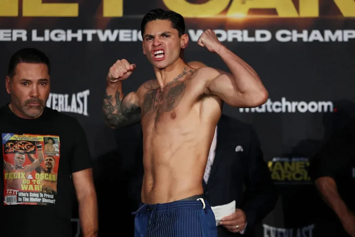 Boxer posing aggressively at weigh-in event Boxer posing aggressively at weigh-in event