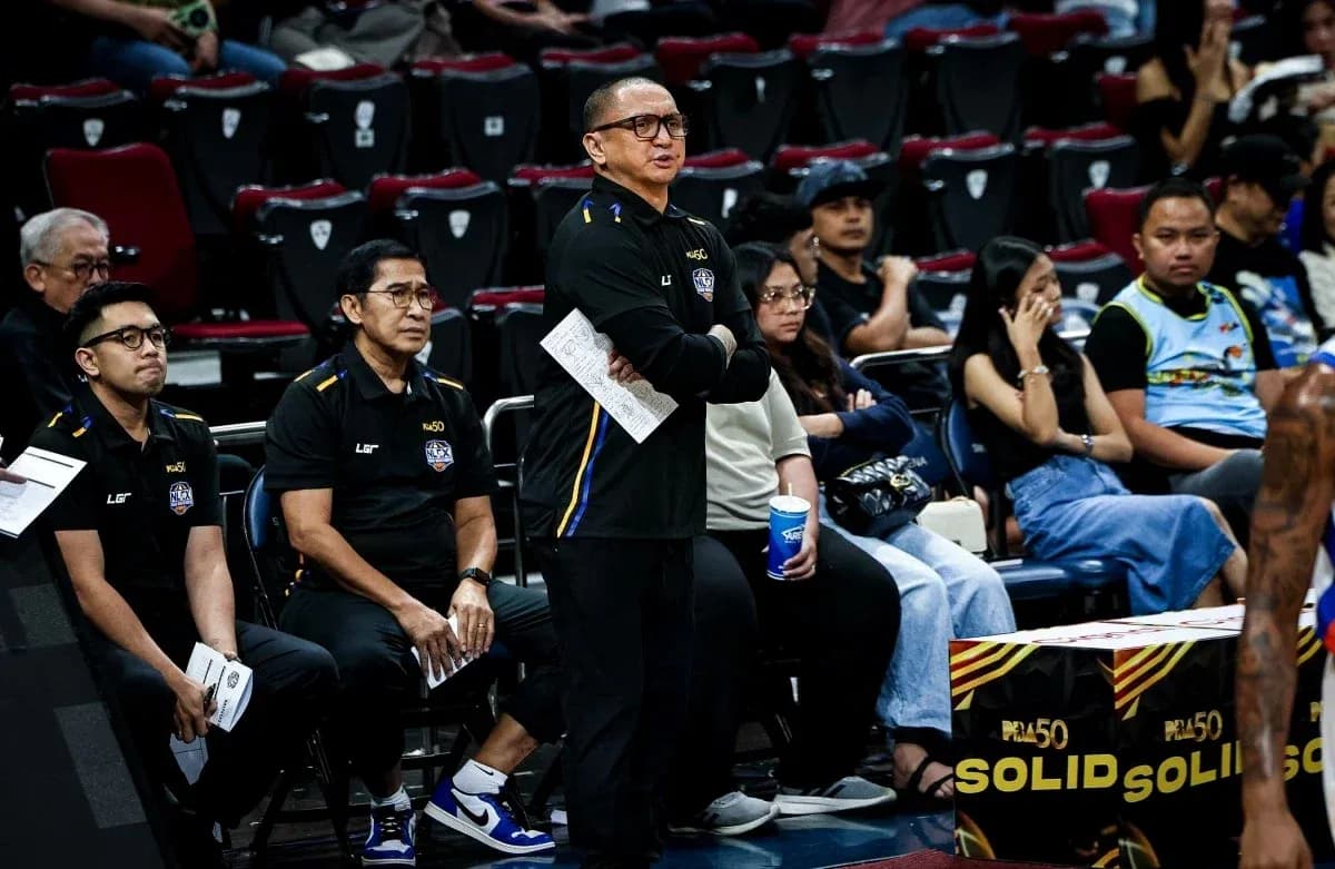 Coaches observing game from the sidelines Coaches observing game from the sidelines