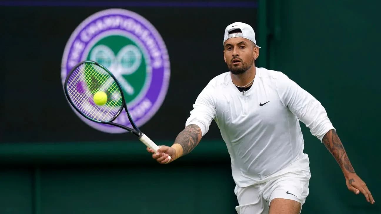 Tennis player hitting a ball at Wimbledon Tennis player hitting a ball at Wimbledon
