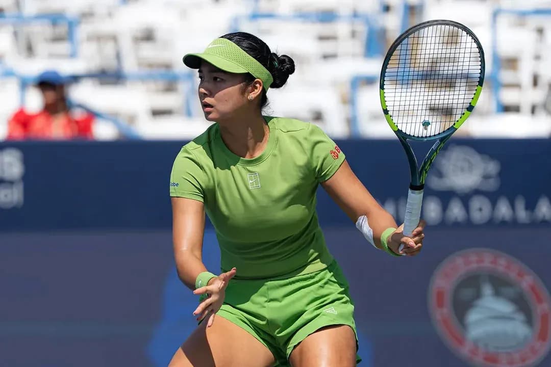 Tennis player preparing to hit a forehand shot Tennis player preparing to hit a forehand shot
