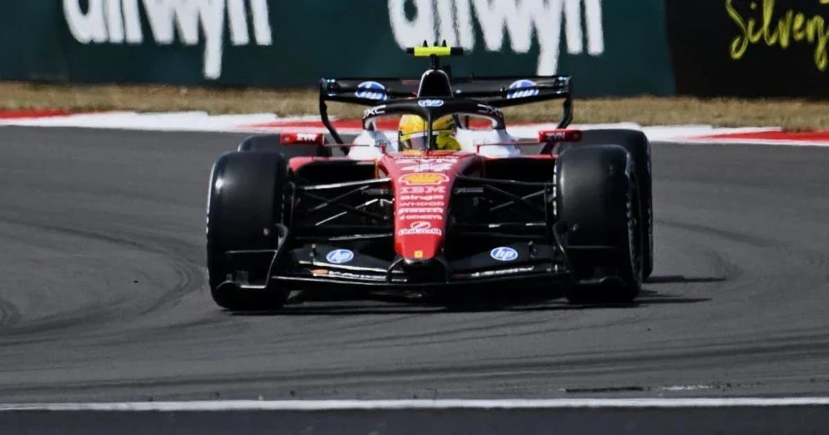 Formula 1 car racing on a track corner Formula 1 car racing on a track corner