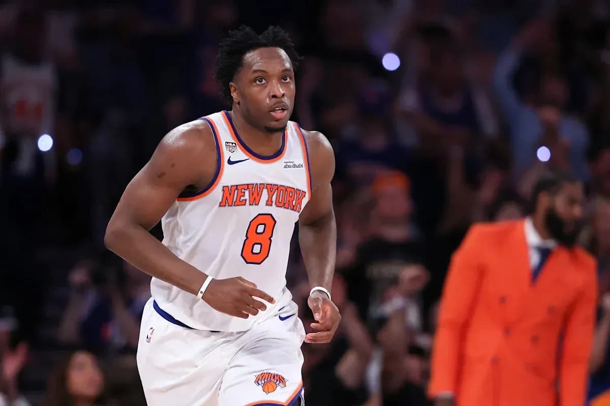 Basketball player running on court during game Basketball player running on court during game