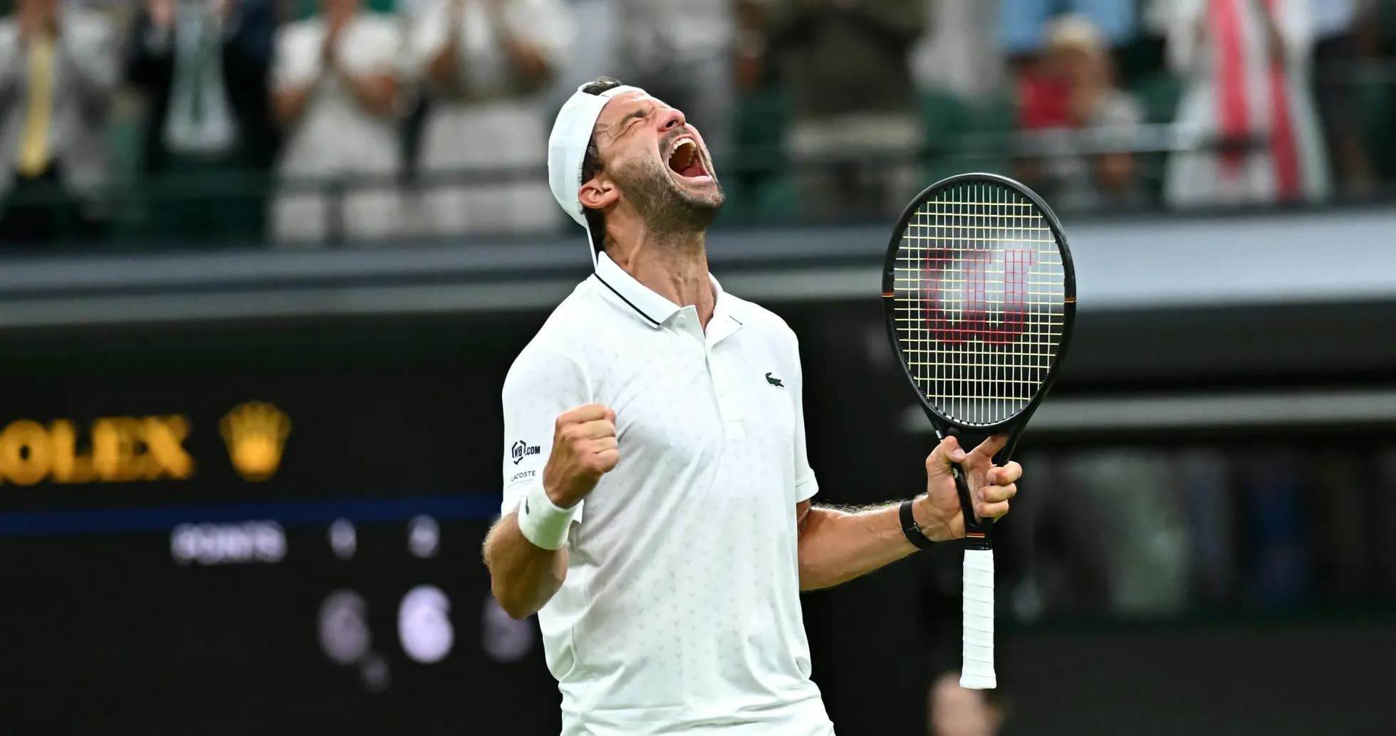 Tennis player celebrating victory at Wimbledon Tennis player celebrating victory at Wimbledon