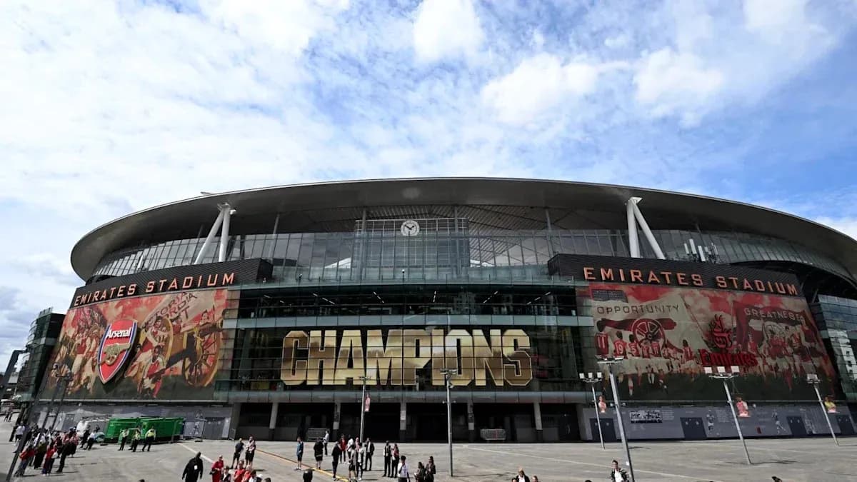Emirates Stadium exterior with 'CHAMPIONS' signage Emirates Stadium exterior with 'CHAMPIONS' signage