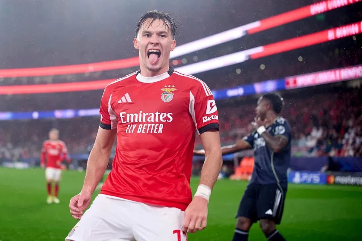 Benfica player celebrating a goal on the field Benfica player celebrating a goal on the field