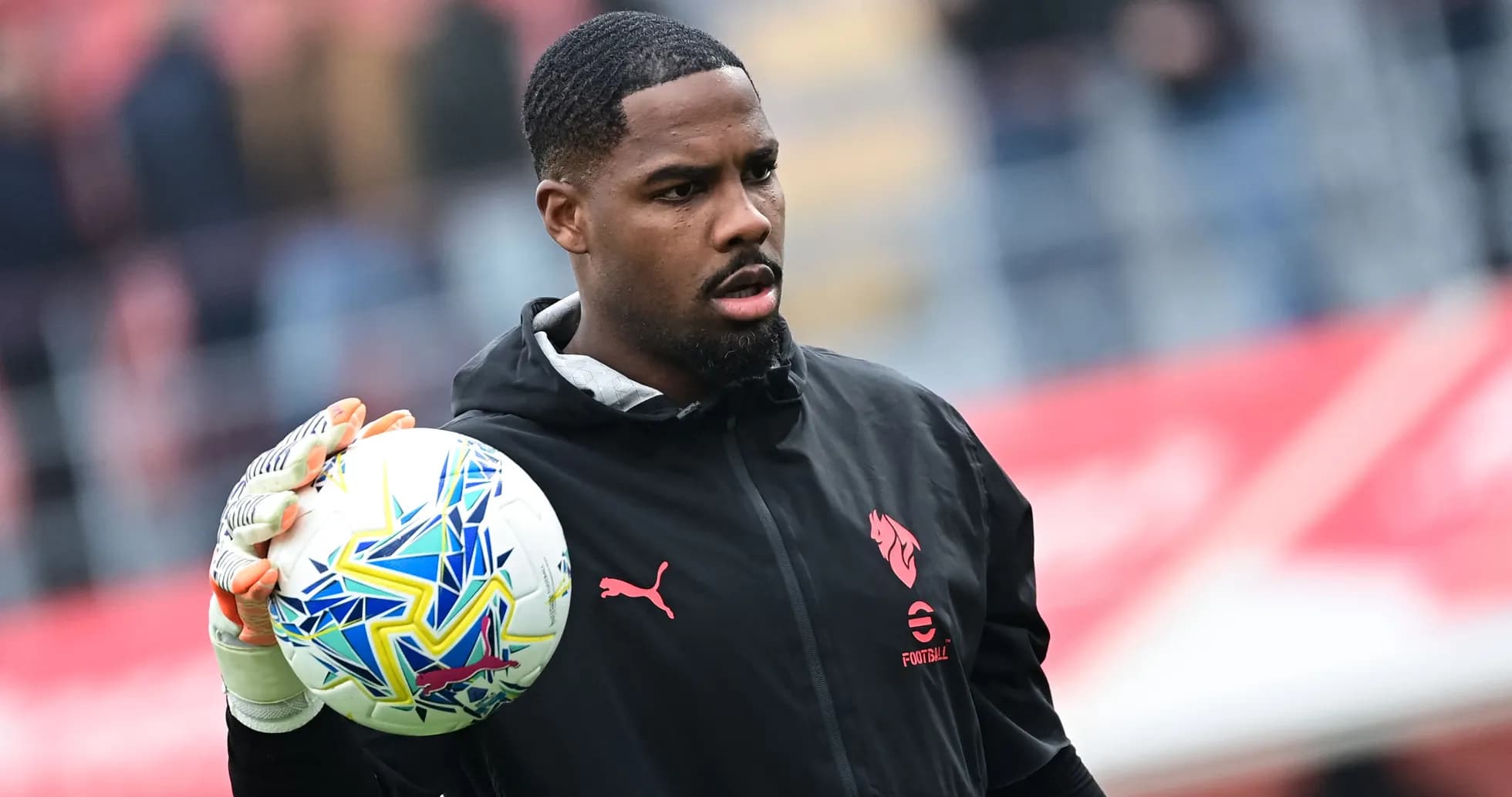 Goalkeeper holding ball before match warm-up Goalkeeper holding ball before match warm-up