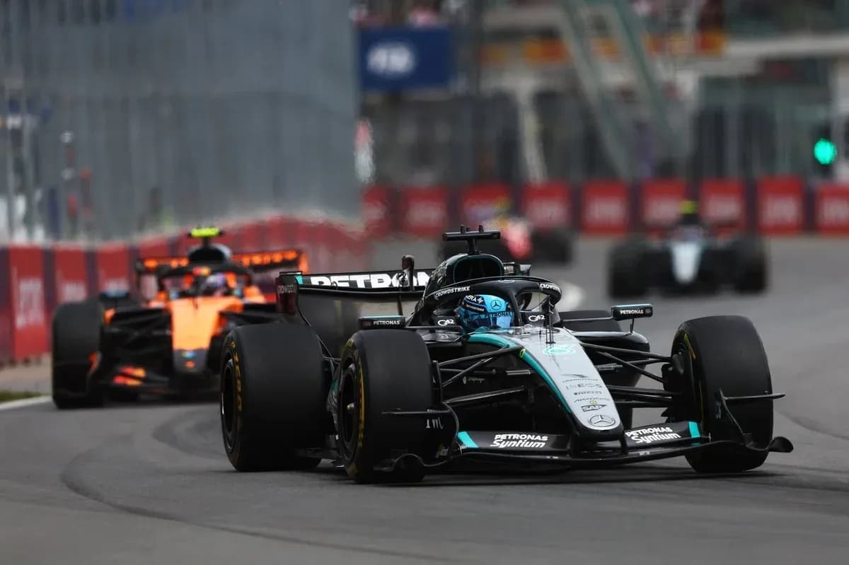 Mercedes and McLaren cars racing on track Mercedes and McLaren cars racing on track