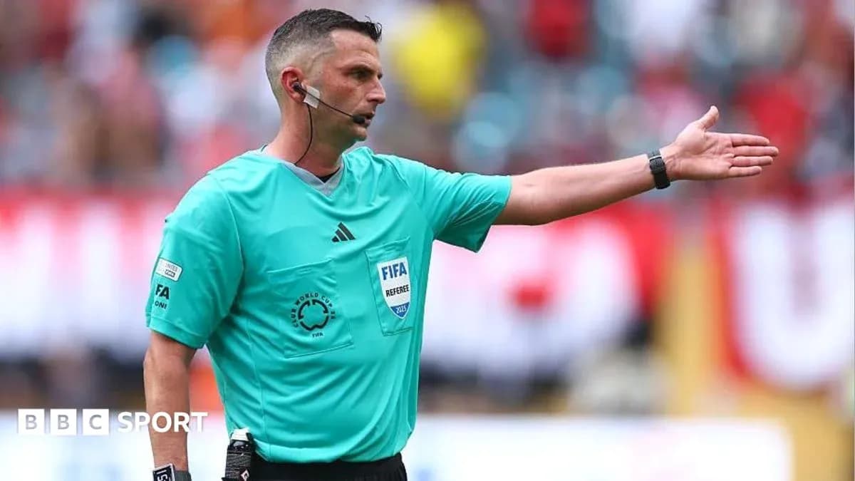 Referee signaling during a football match Referee signaling during a football match