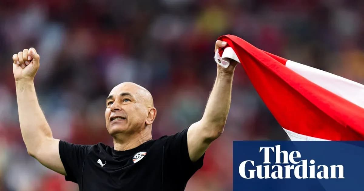 Coach celebrating with national flag after match Coach celebrating with national flag after match