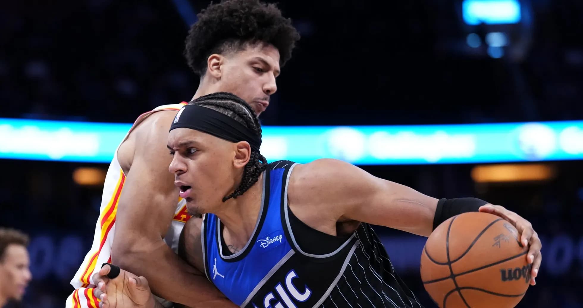 Two basketball players battling for possession of the ball Two basketball players battling for possession of the ball