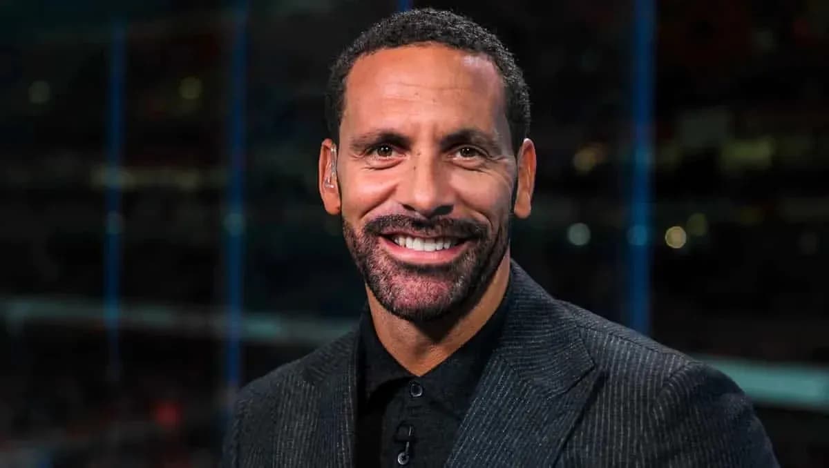 Analyst smiling during sports broadcast segment Analyst smiling during sports broadcast segment